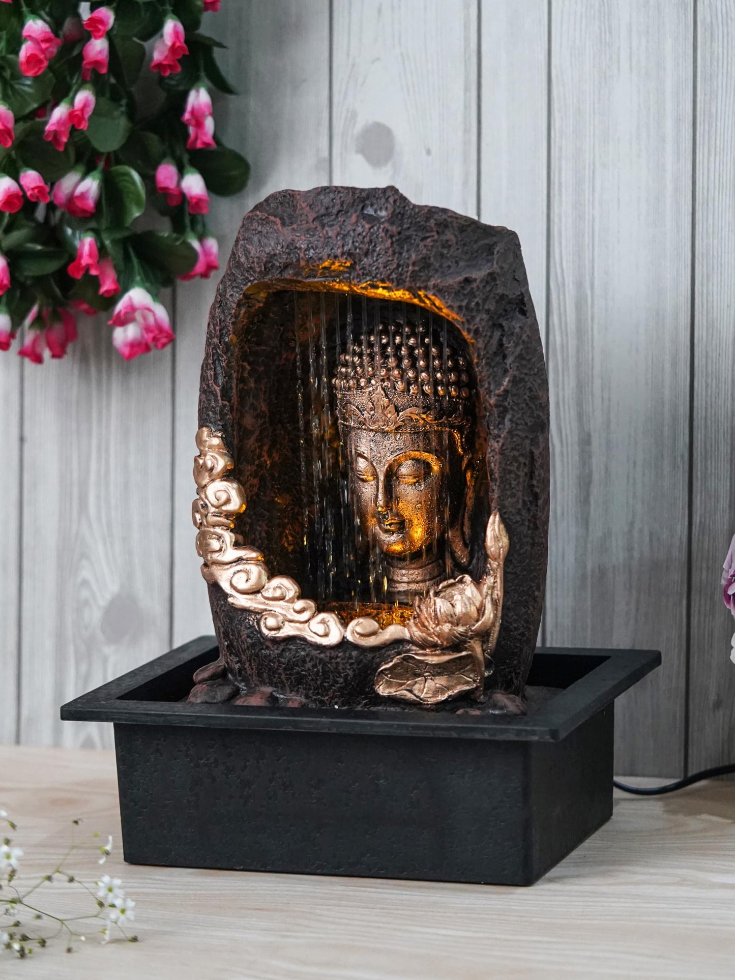 Meditating Buddha Sitting in Cave Fountain